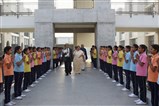 Dr. Janak Dave walking towards Library as the students chant Vedic Mantras