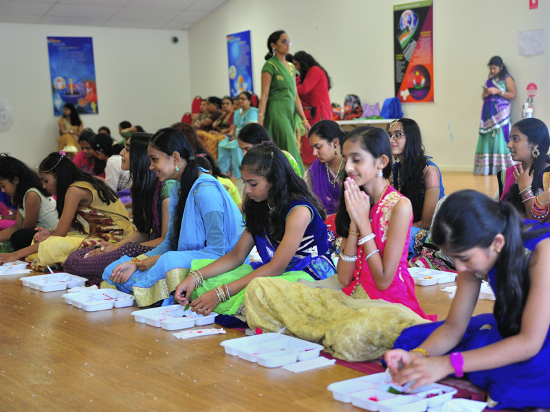 Devotees participate in patotsav mahapuja rituals