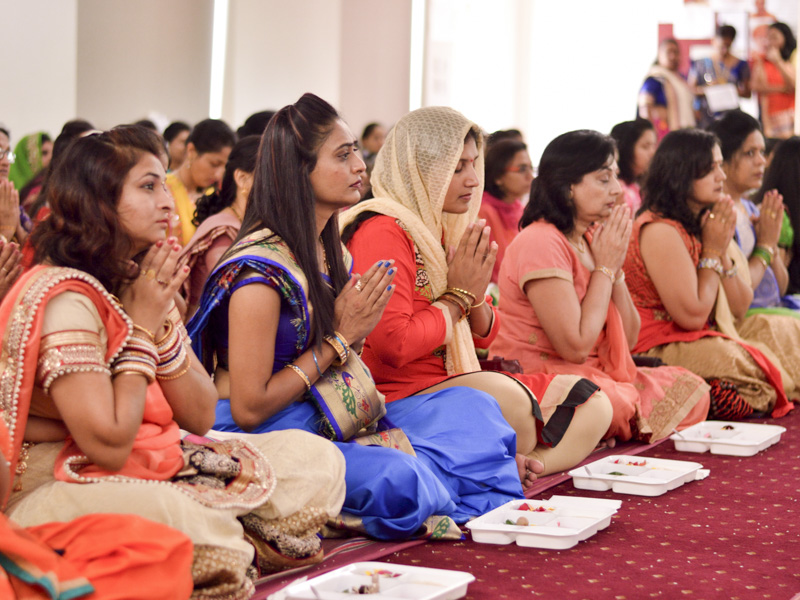 Devotees participate in patotsav mahapuja rituals