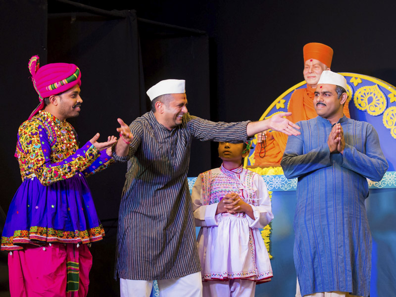A skit presentation by devotees in the welcome assembly