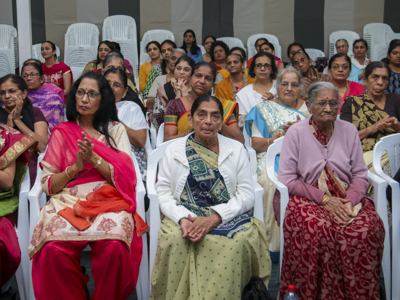 Devotees during the kirtan aradhana assembly
