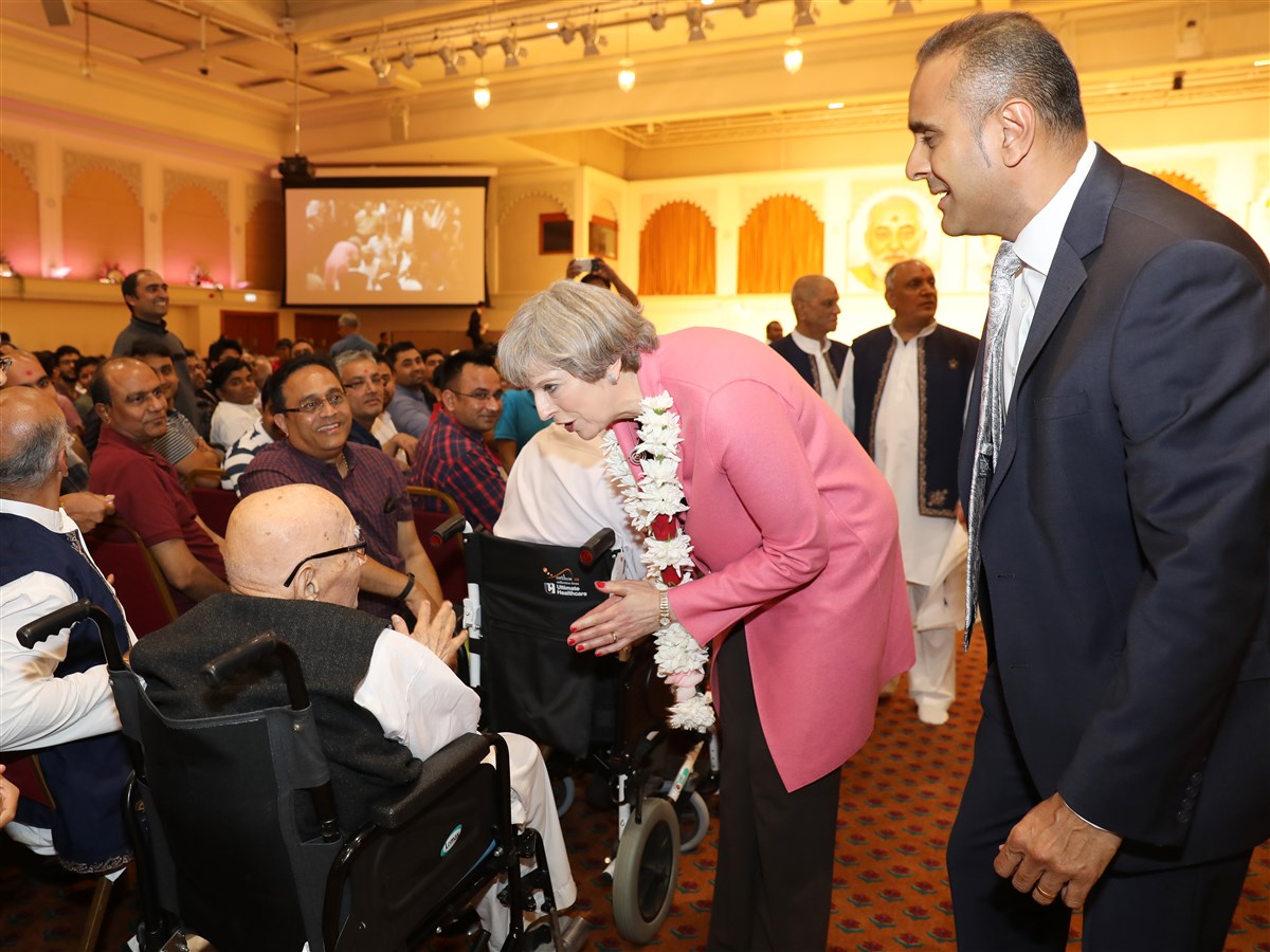 Prime Minister Theresa May meets with the devotees