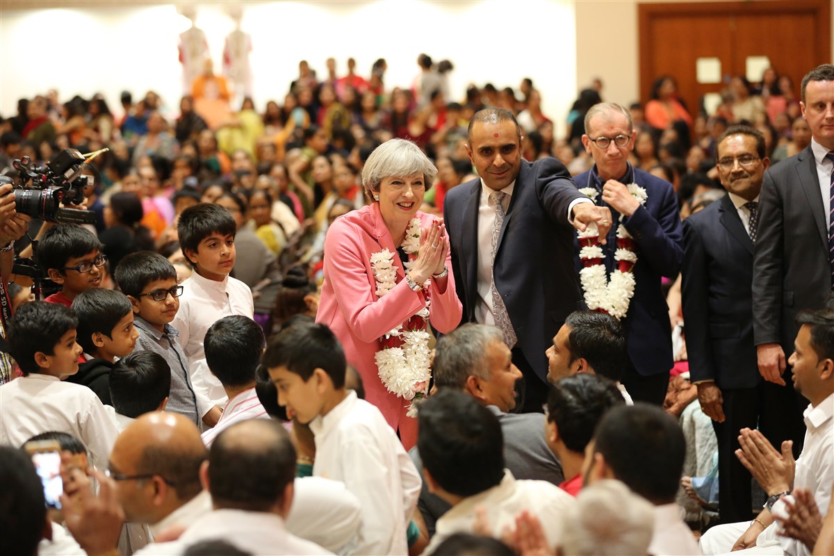 Prime Minister Theresa May meets with the devotees