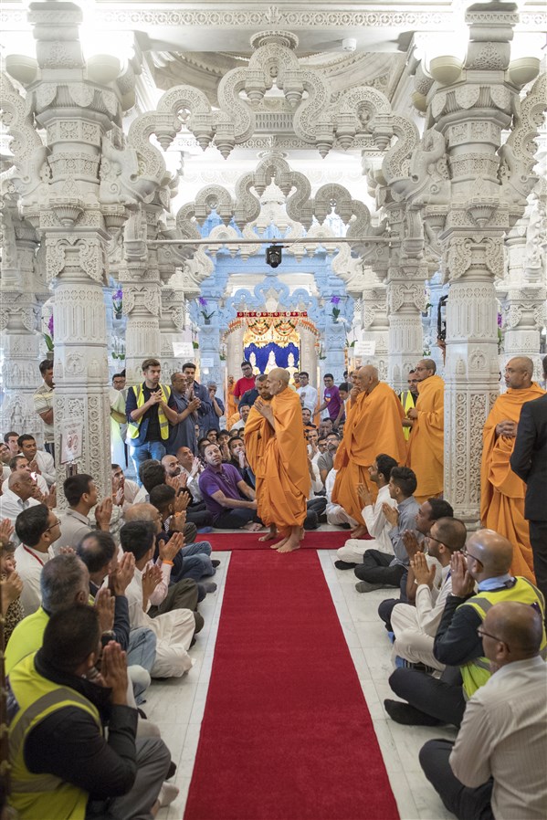 Swamishri doing darshan of the various khands in the main mandir