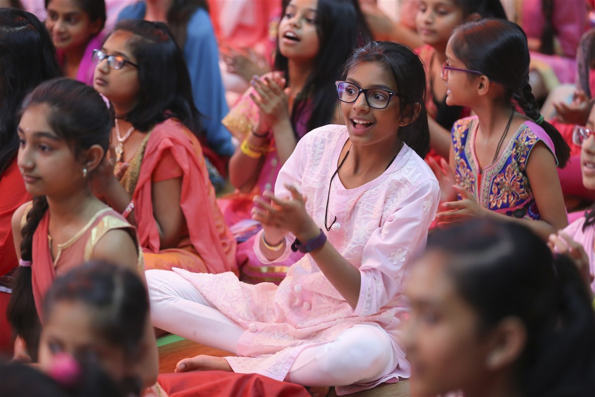 Children listen attentively in the Bal-Balika Satsang Shibir, London, UK