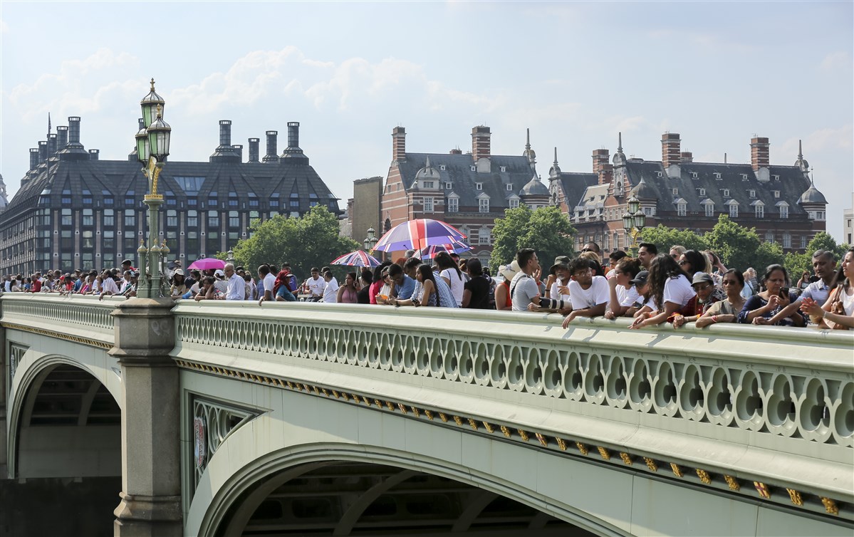 The devotees lined the route, including along Westminster Bridge