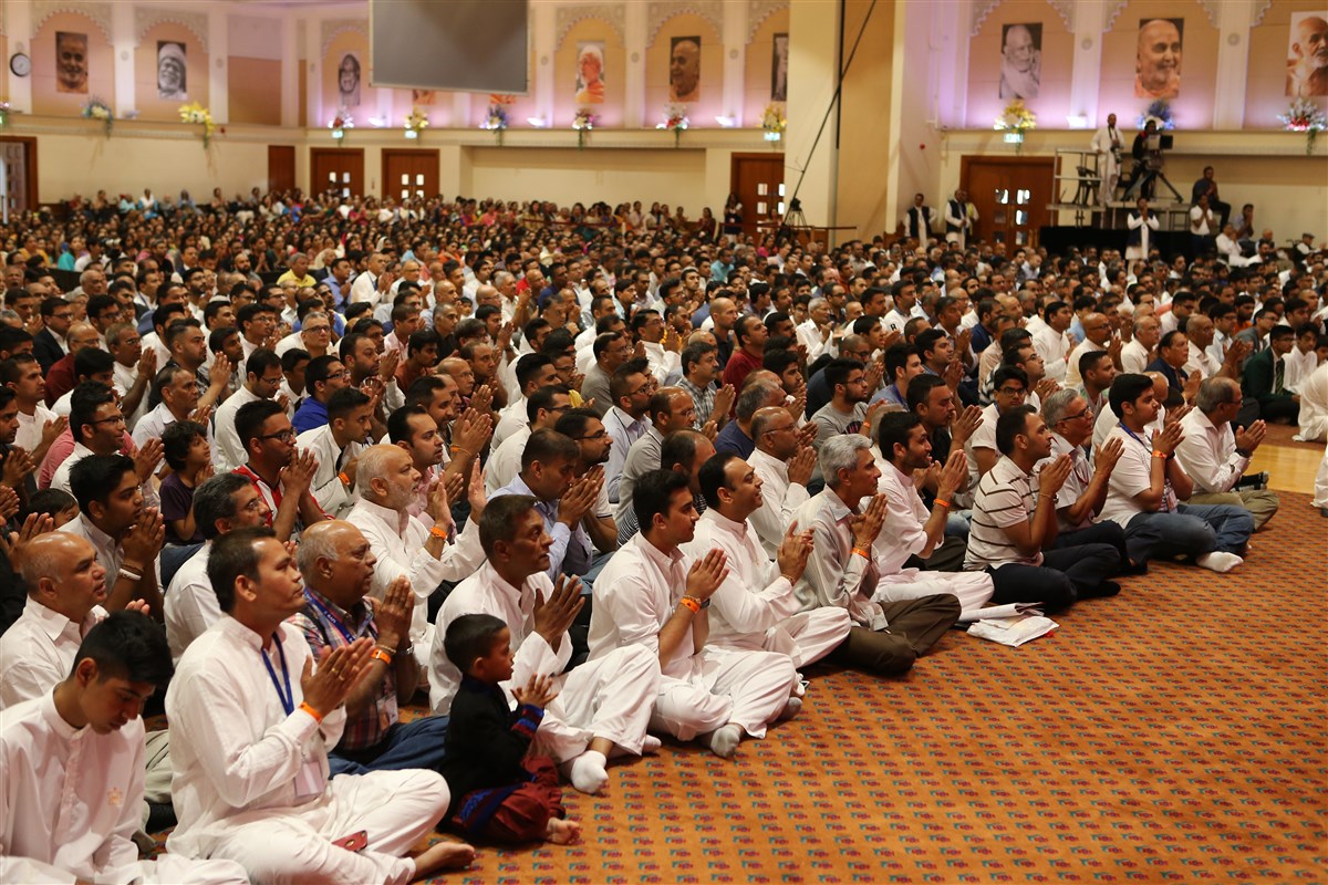 Devotees reciprocate with folded hands