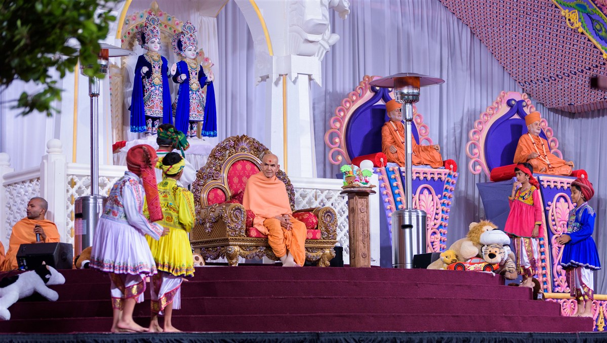 Children perform a skit before Swamishri