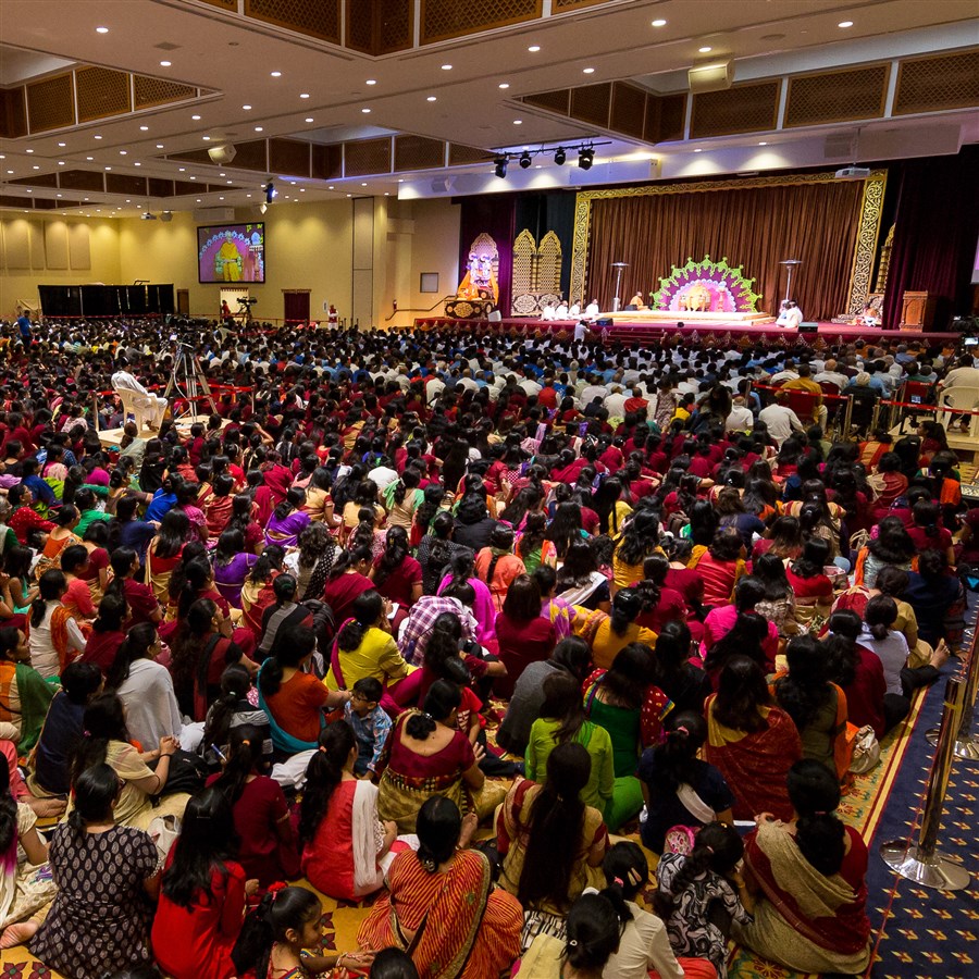 Devotees engaged in the program