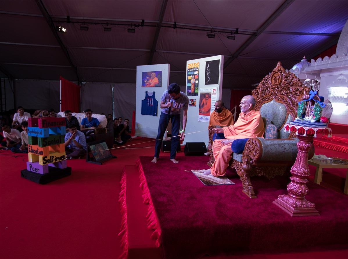 Swamishri engaged in the program