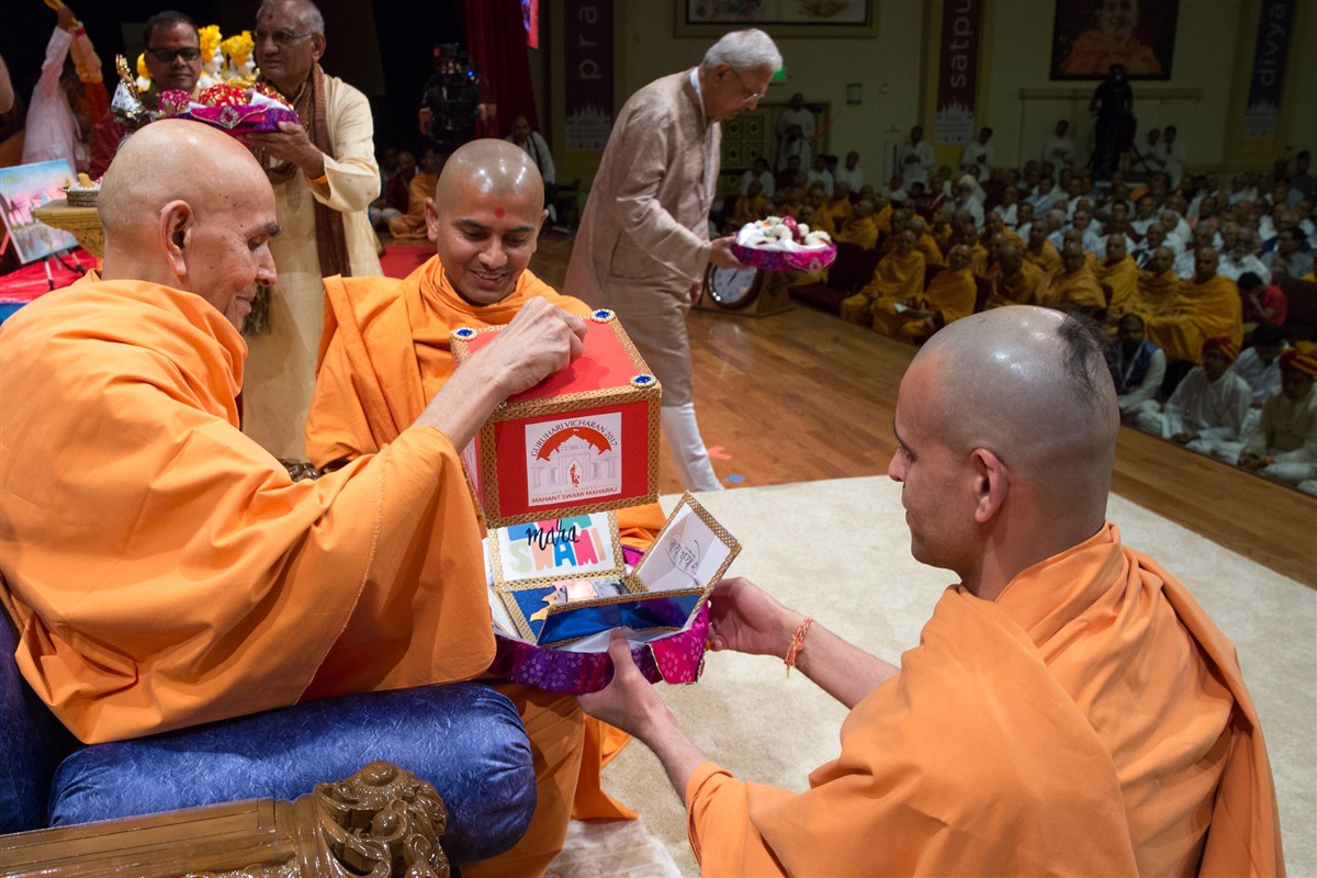 Swamishri receives an invitation to attend festivities in Houston and Dallas
