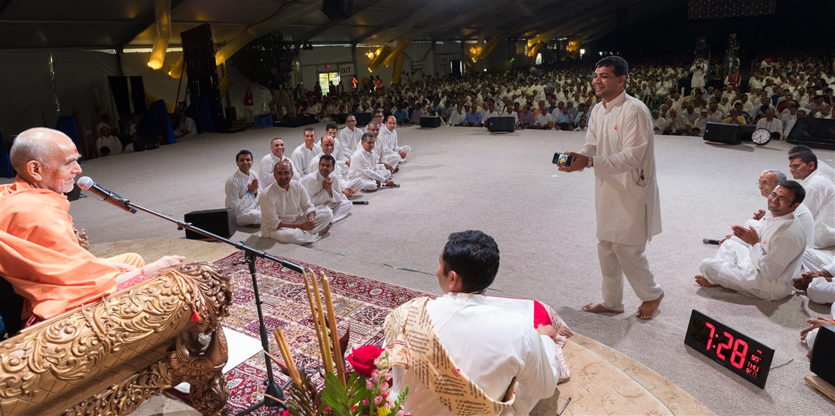 Devotees perform a skit before Swamishri