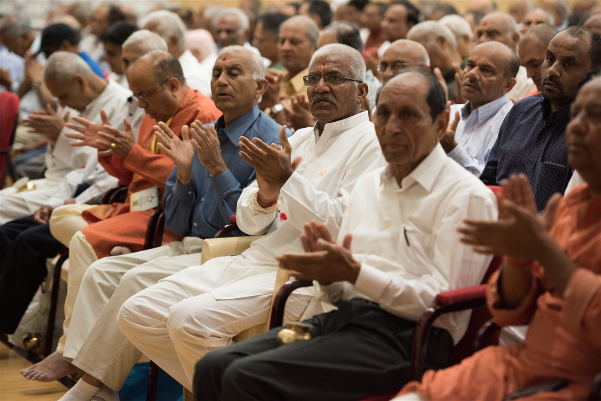Devotees engaged in the ceremony