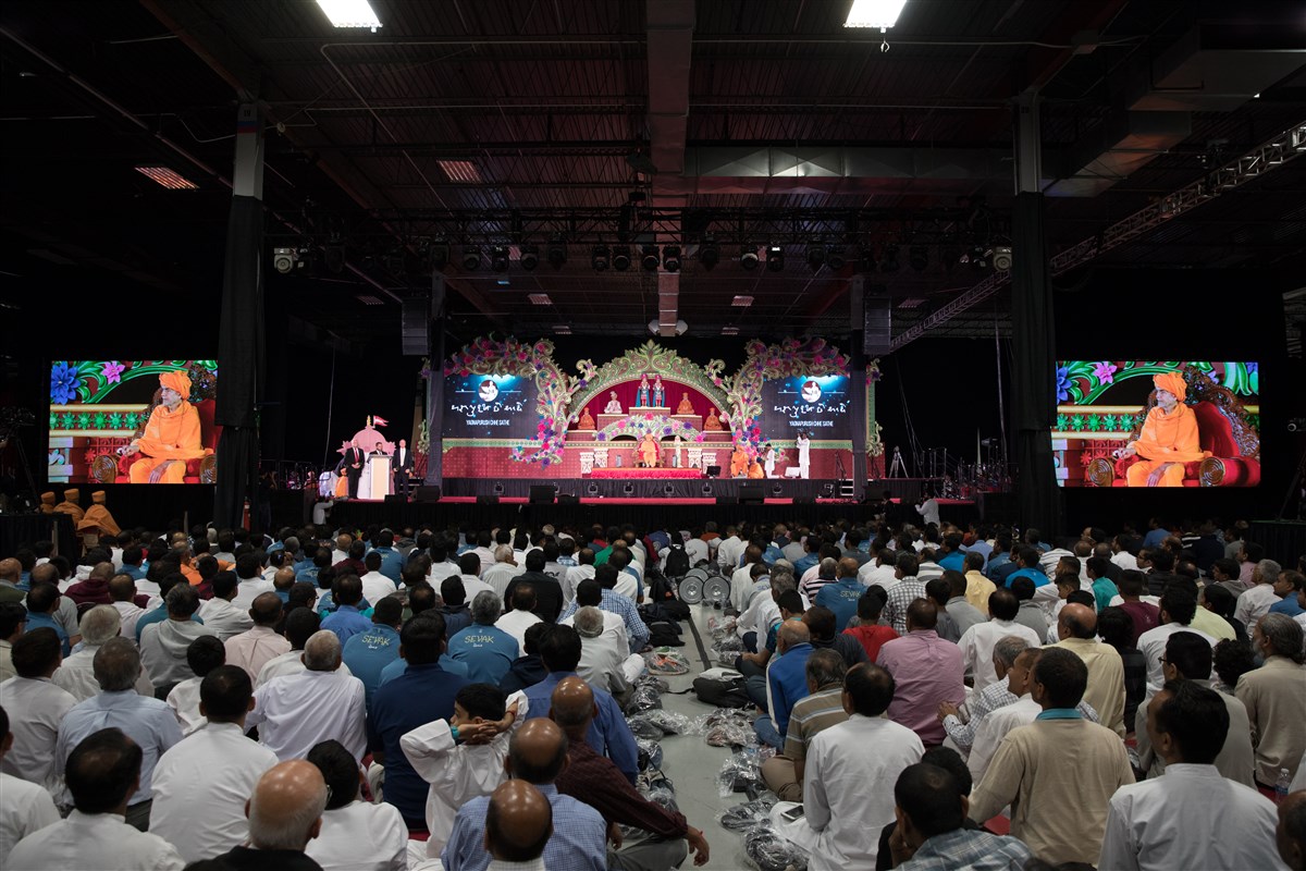 Devotees engaged in the assembly