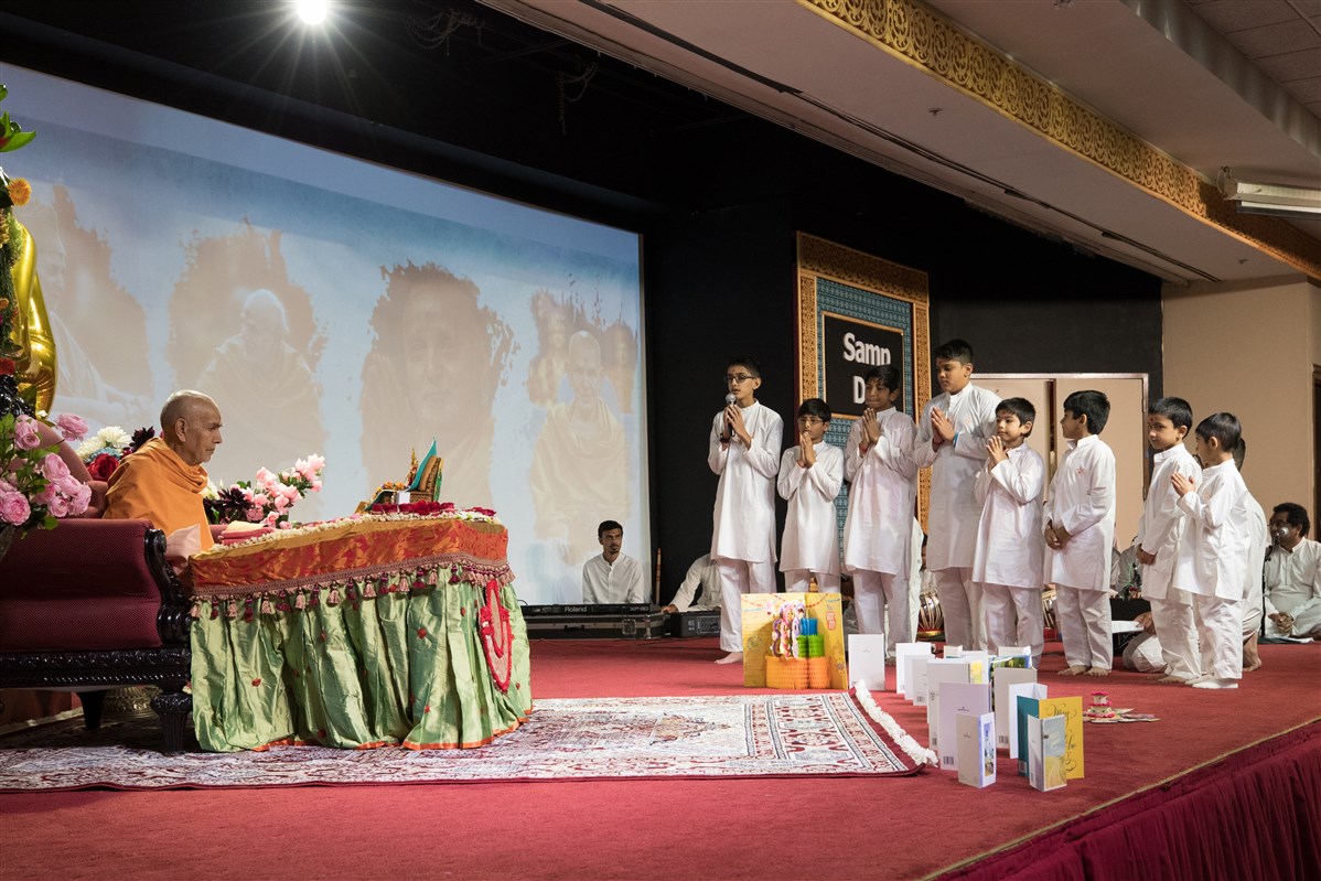 Children recite shlokas during puja
