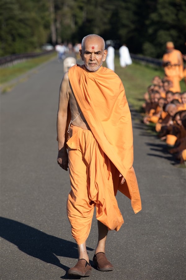 Swamishri engaged in his afternoon walk, 18 September 2017