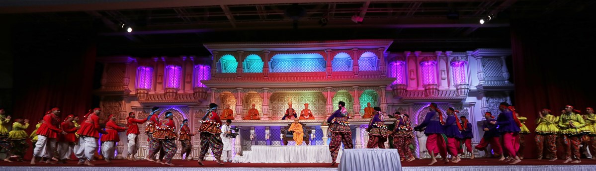 Youths perform a vibrant dance in celebration of Sharad Purnima