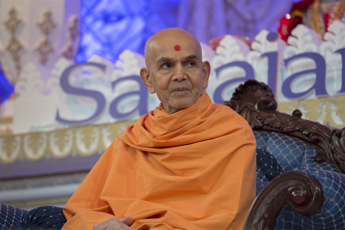 Swamishri listens attentively to the skit...