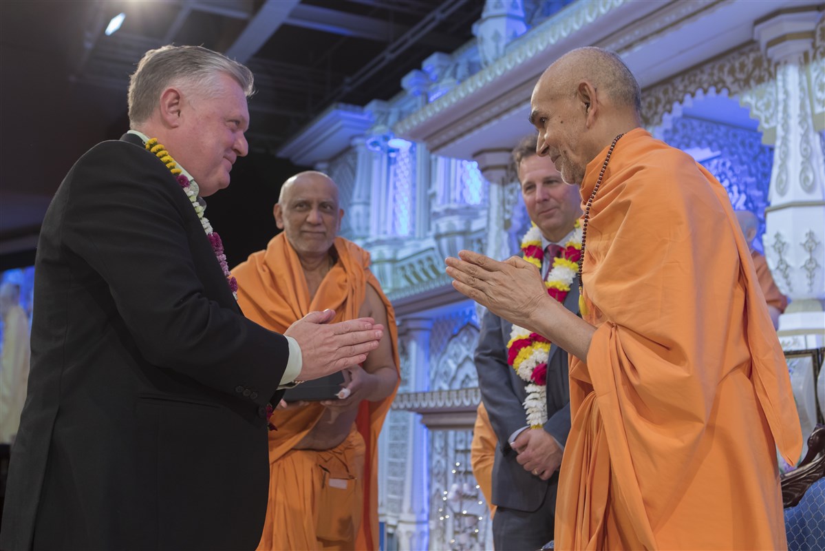 Swamishri greets officials from Queens Park Rangers Football Club