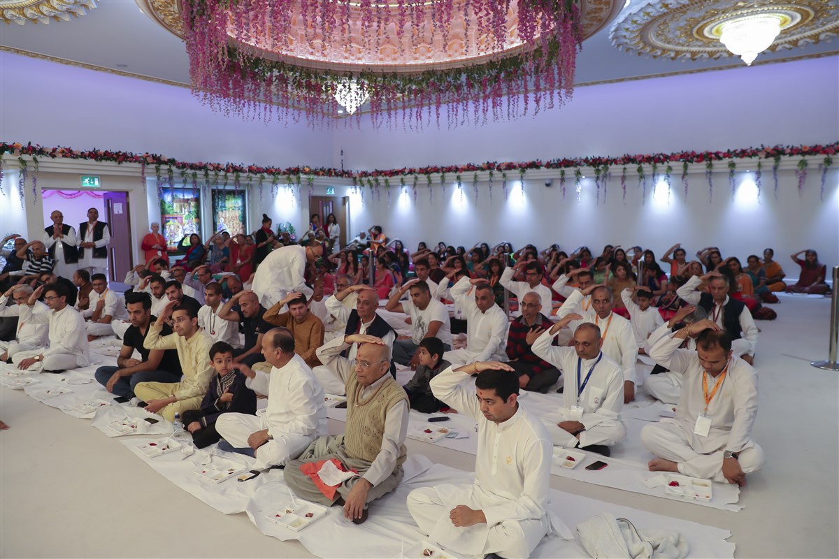 Devotees engaged in the patotsav mahapuja