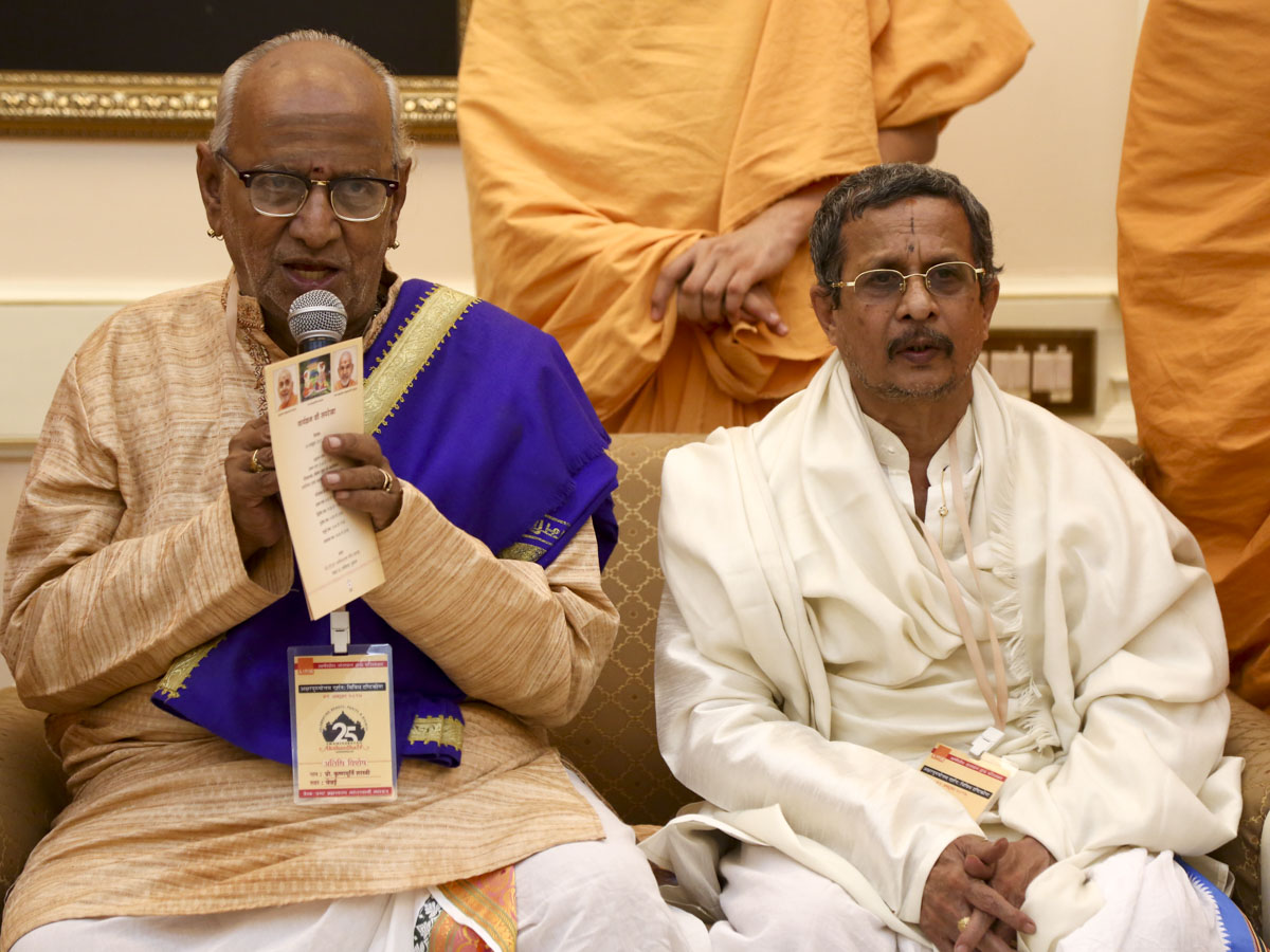 Scholars meet with HH Mahant Swami Maharaj and senior swamis