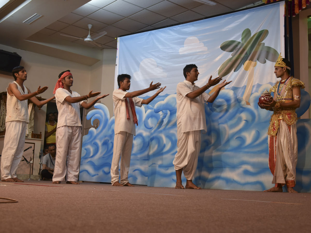 Youths perform a skit in the evening 'Gramya Din' assembly