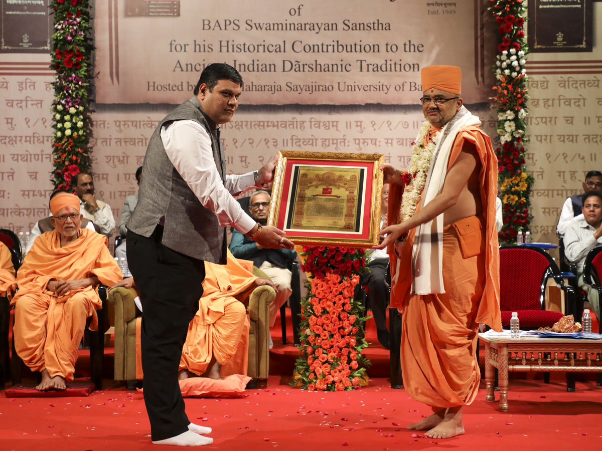 Vice Chancellor Dr. Mahendra Sharma of Ganpat University honors Bhadresh Swami