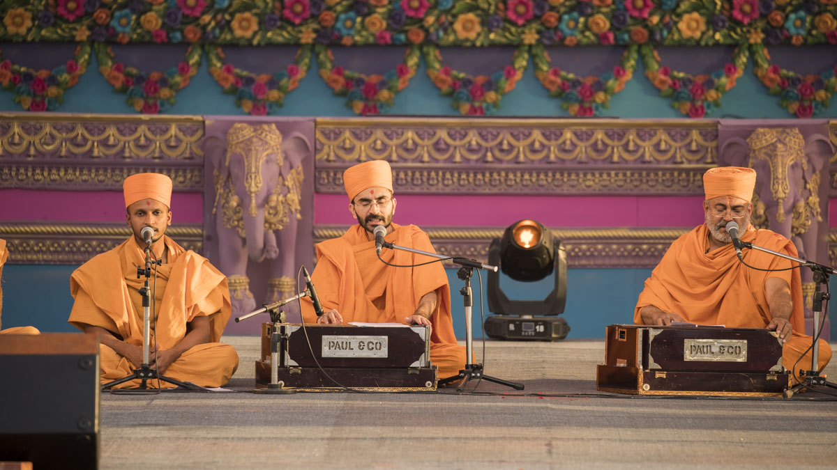 Sadhus sings kirtans in the beginning of the celebration assembly