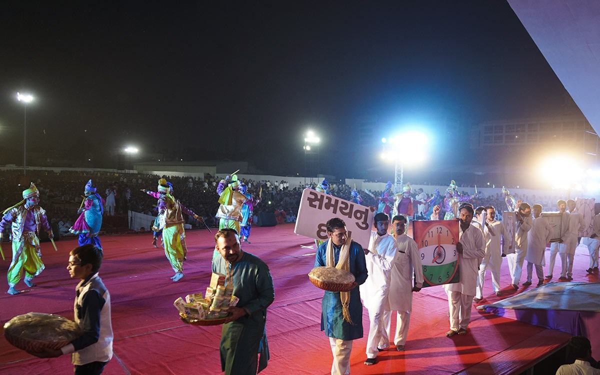 Children and youths present a thematic parade to celebrate the Jholi festival