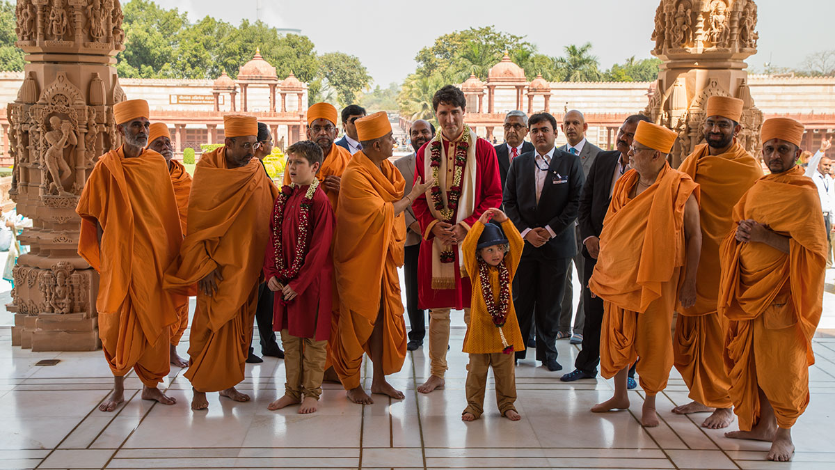 Sadhus guide PM Justin Trudeau in the Akshardham Mandir