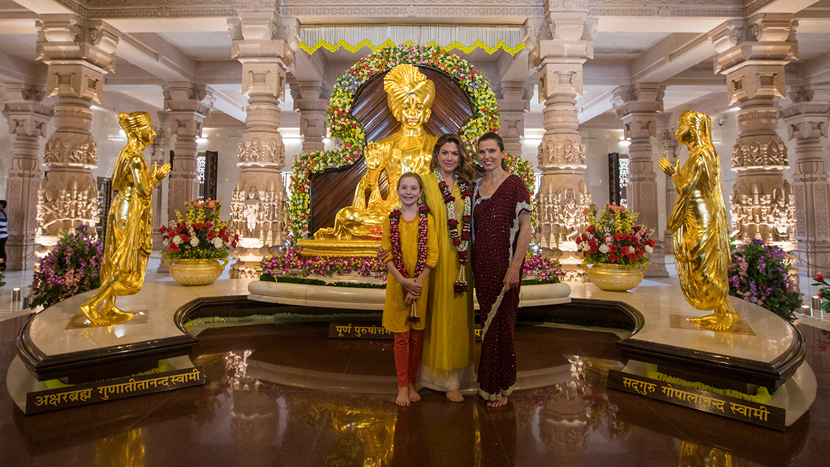 Sophie Grégoire Trudeau, Ella-Grace Margaret Trudeau and Minister Kirsty Duncan before the murtis inside the Akshardham Mandir
