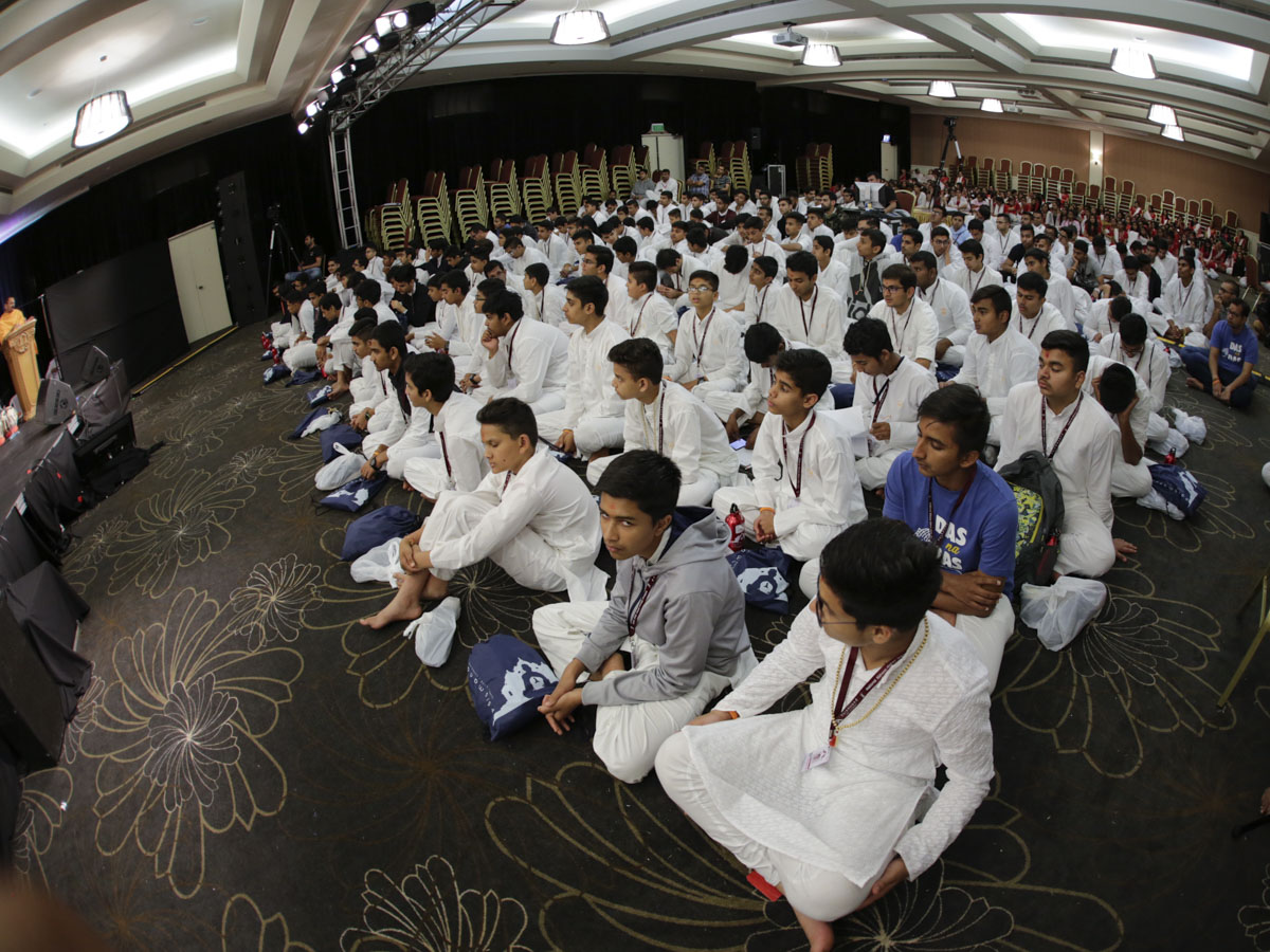 Kishores during the kirtan aradhana