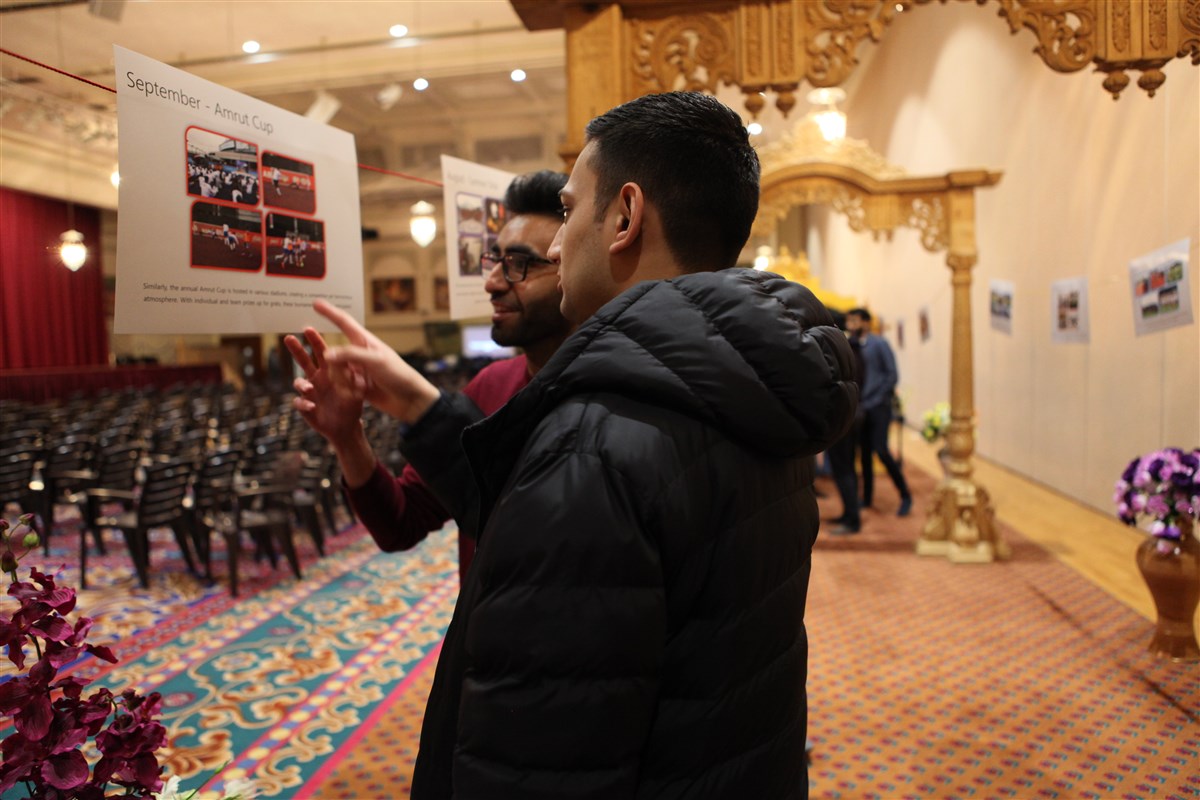 Delegates learn about some of the youth activities at the Mandir