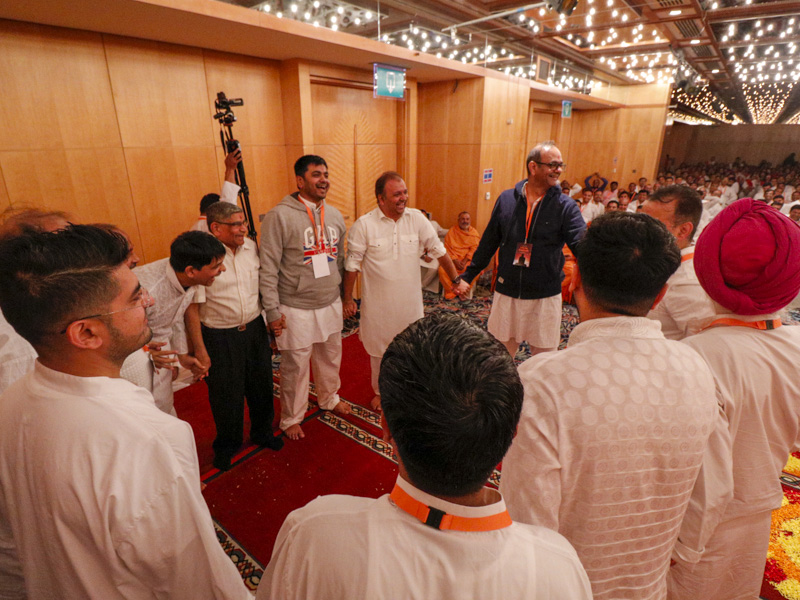 Devotees participate in a shibir activity