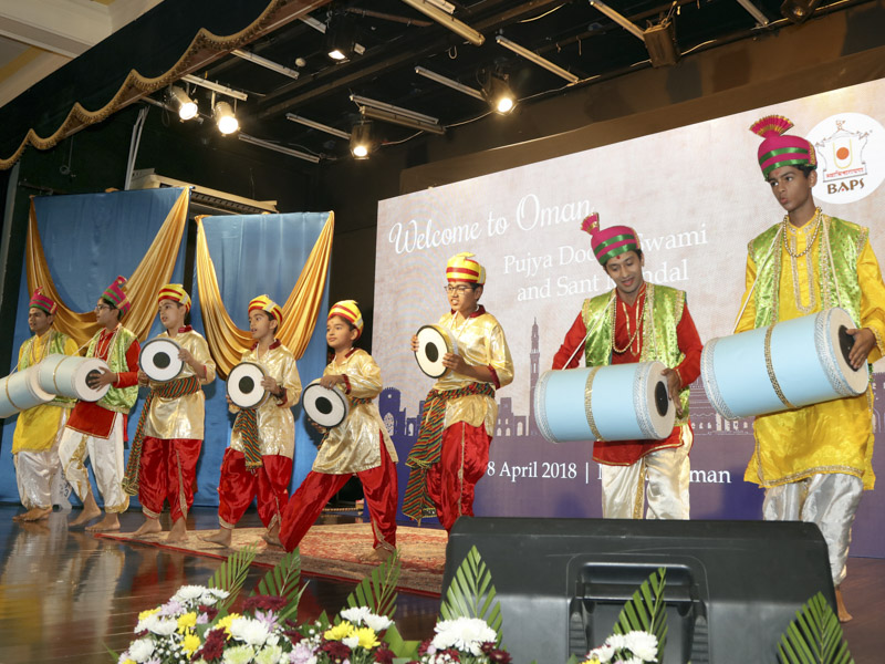 Children perform a welcome dance