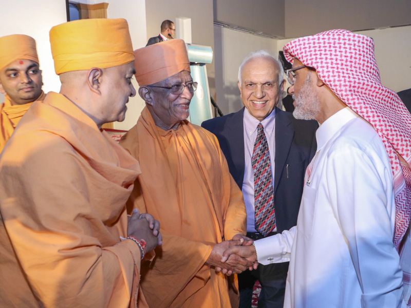 Pujya Doctor Swami greets a guest
