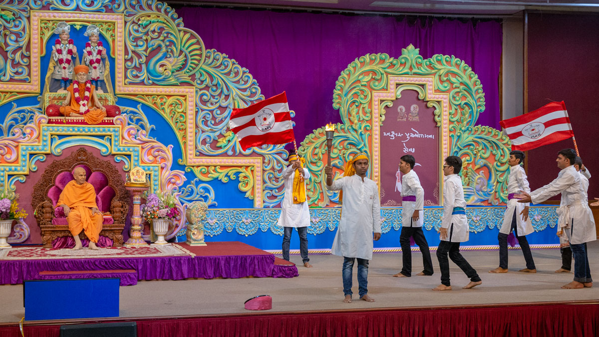 Youths perform a dance