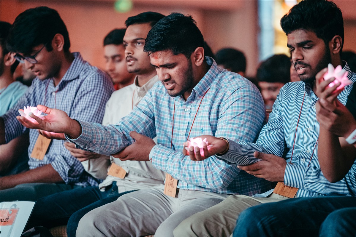 Delegates perform the evening arti