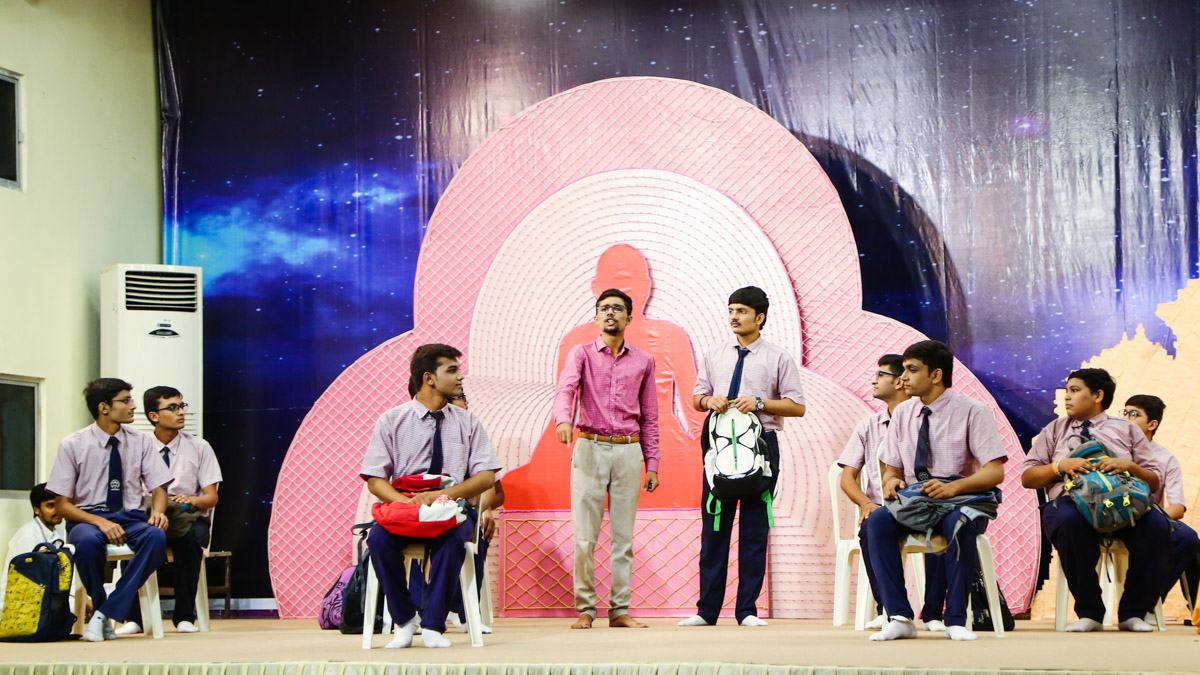 A skit presentation by youths in the evening satsang assembly