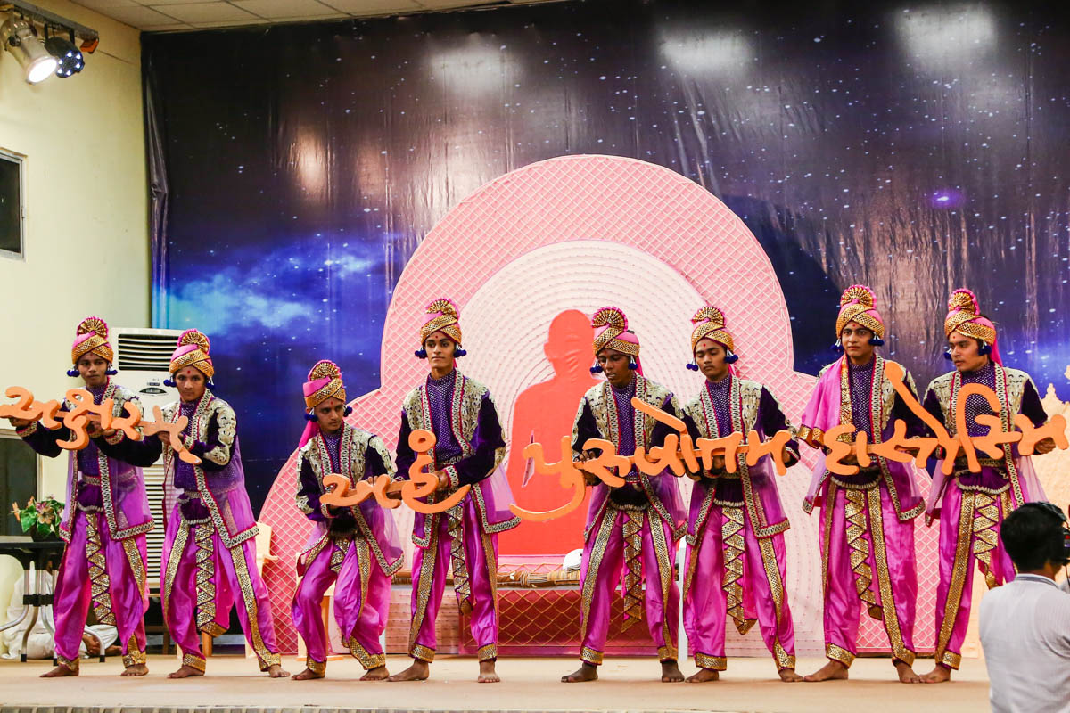 Youths perform a traditional dance