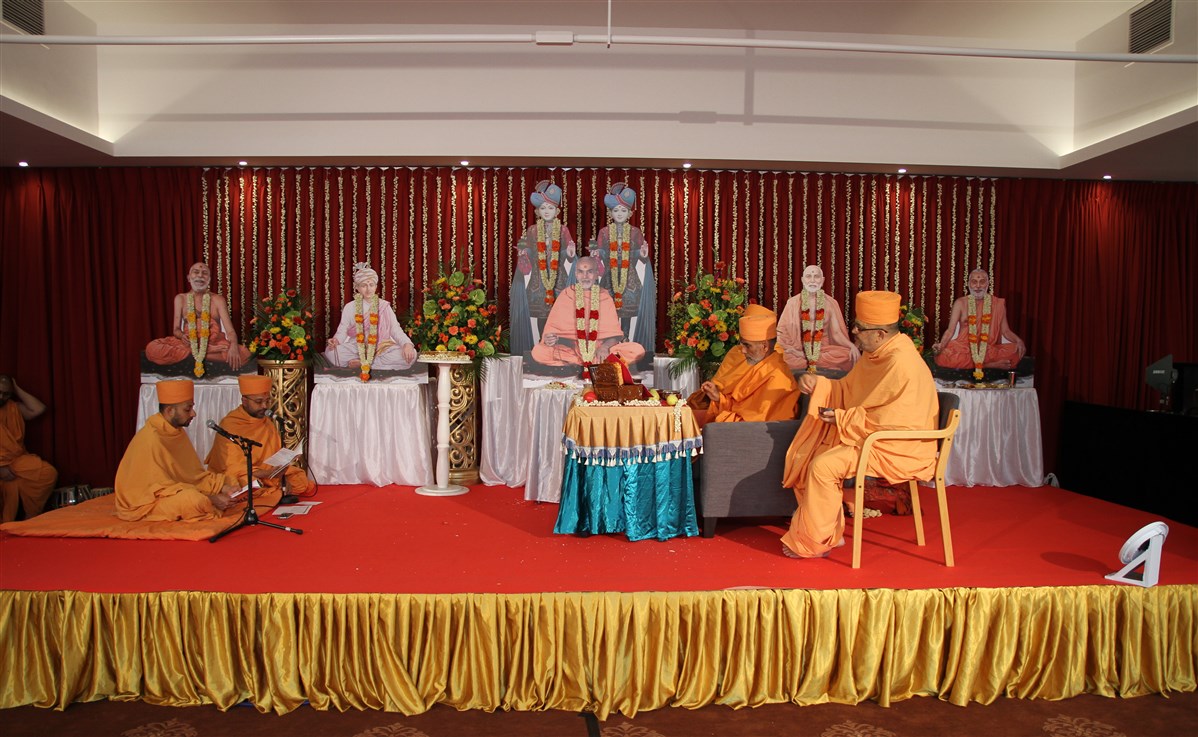 Senior swamis perform the mandir inauguration mahapuja