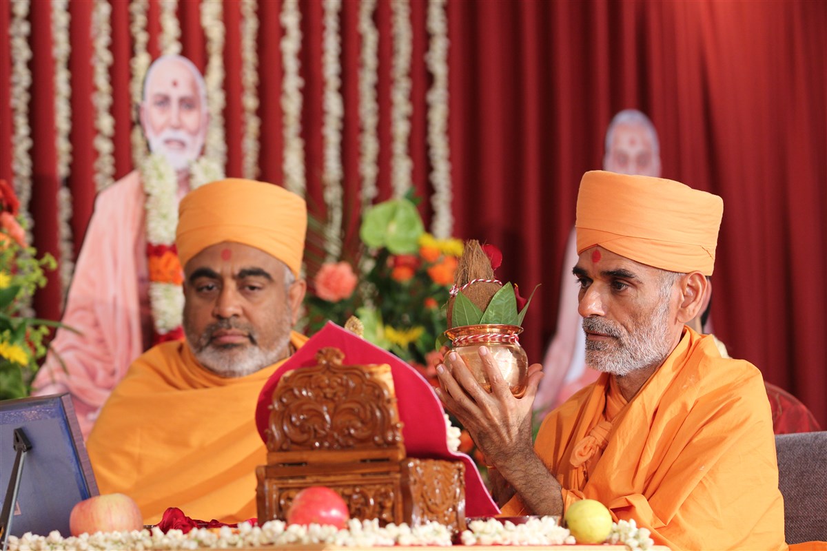 Senior swamis perform the mandir inauguration mahapuja