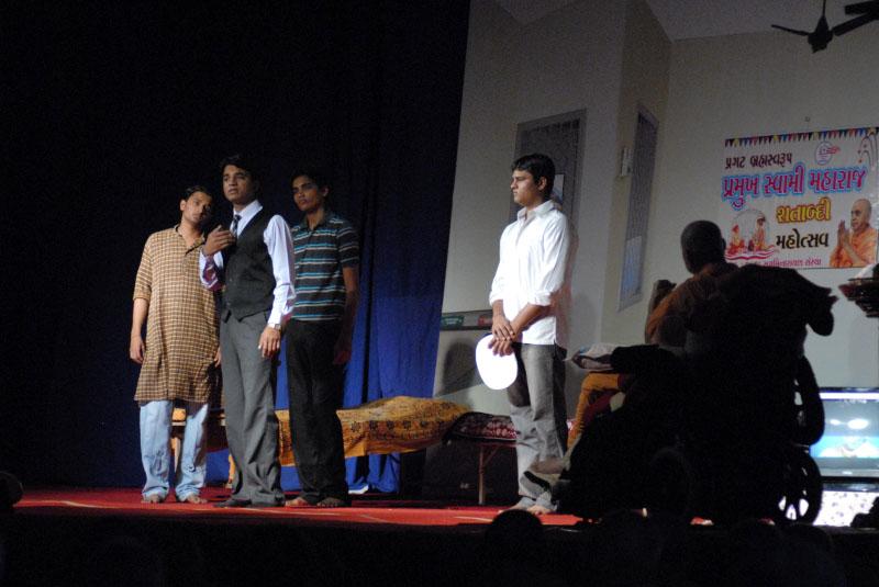 Youths perform a drama before Swamishri