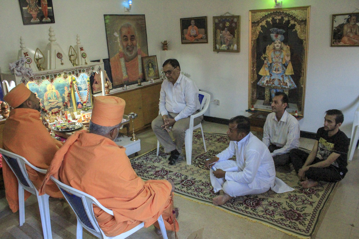 Sadhus converse with devotees and well-wishers during padhramanis