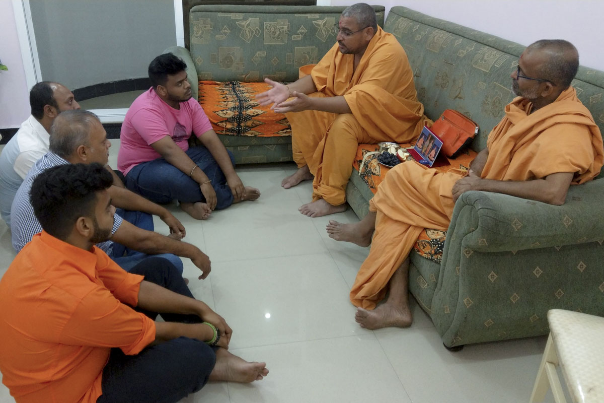 Sadhus converse with devotees and well-wishers during padhramanis