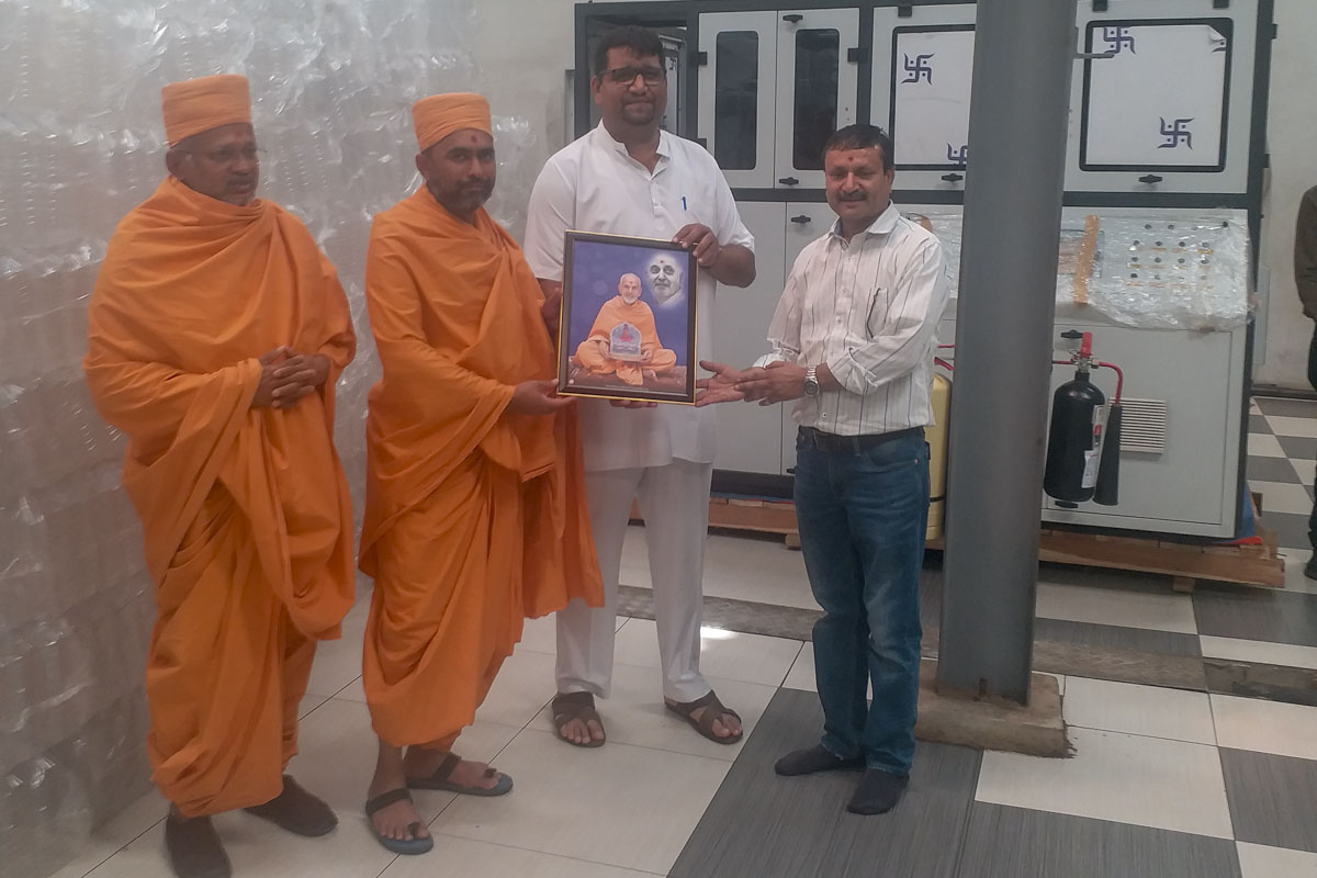 Memento presented to devotees and well-wishers