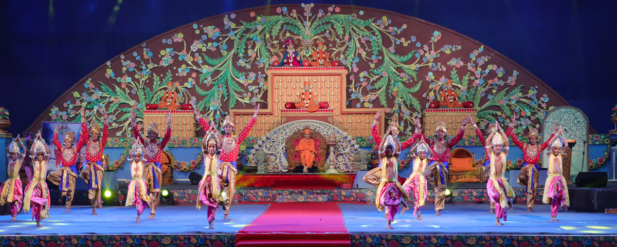 Children and youths perform a traditional dance