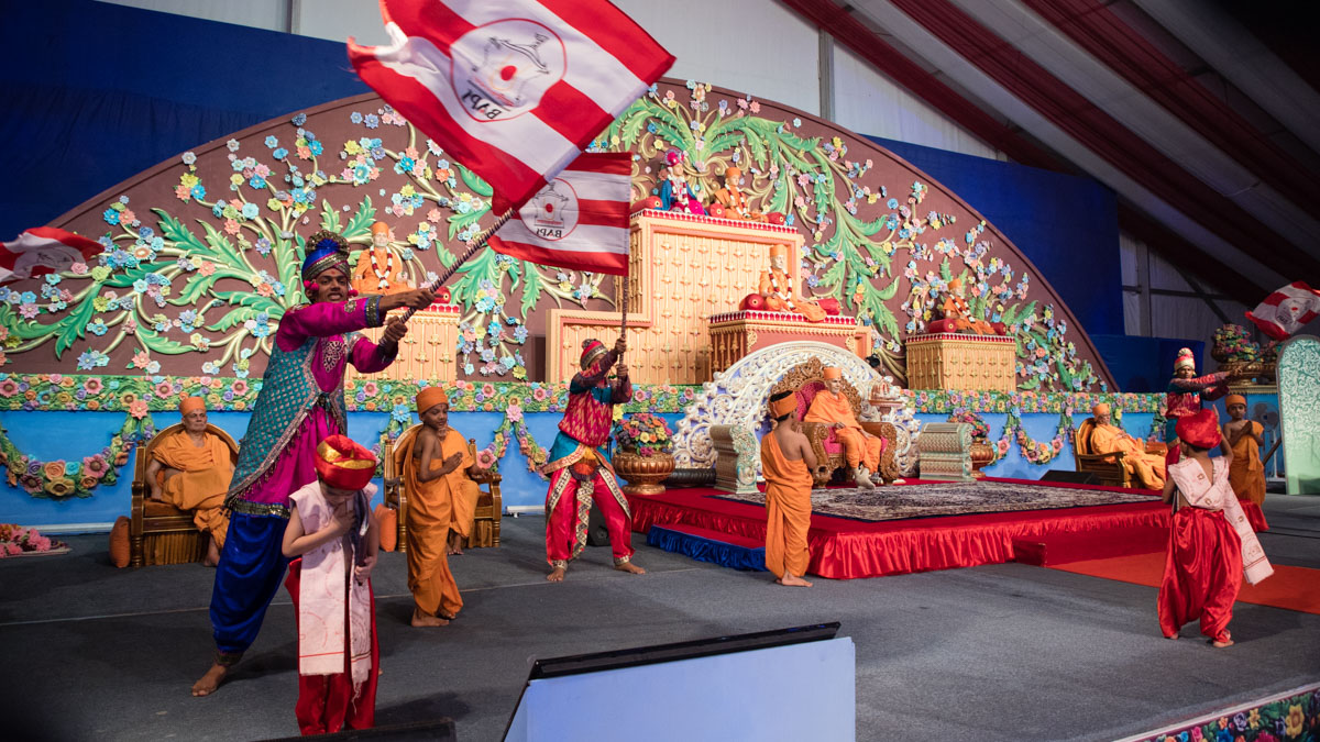 Children and youths perform a traditional dance