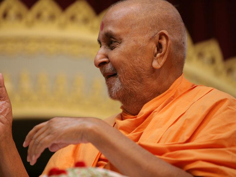 Swamishri is seen absorbed in the cultural program 