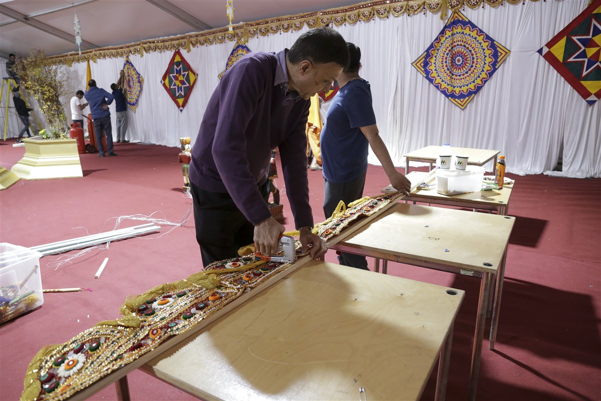 Volunteers prepare the guest reception